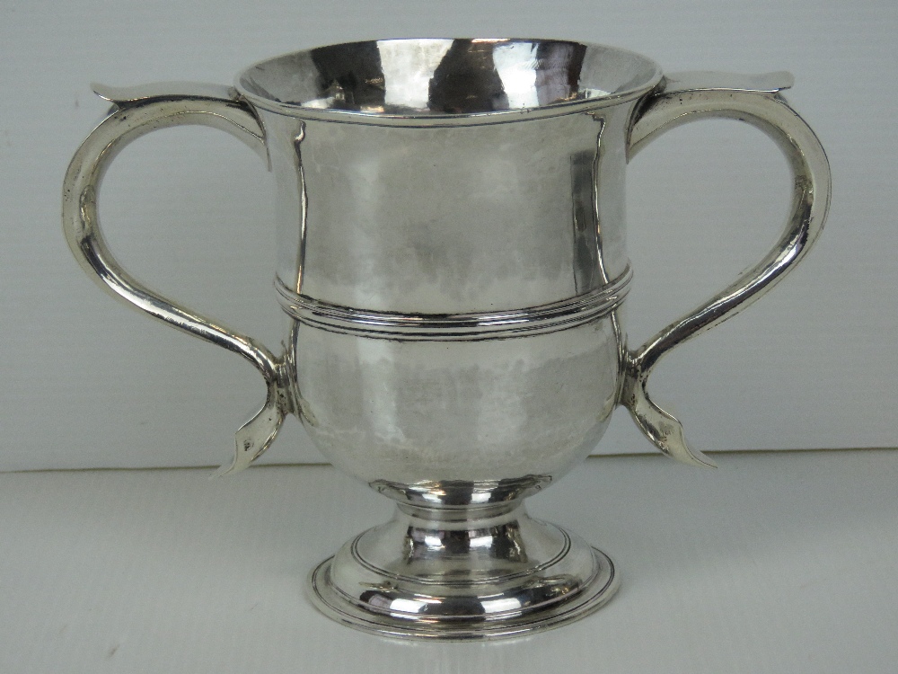 A Georgian HM silver twin handled cup with single foot,