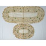 Two vintage sheer cotton table runners, each with gilded thread hand stitched floral border,