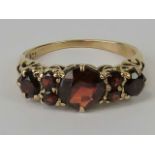 A 9ct gold garnet ring,