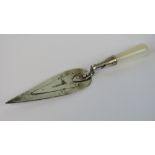 A delightful HM silver miniature bookmark in the form of a trowel,