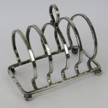 A HM silver toast rack, hallmarked London 1915, 10cm in length, 2.3ozt.