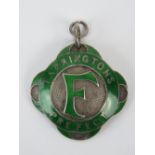 A HM silver and green enamel fob 'Farringtons Prefect', hallmarked Birmingham 1925.