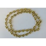 A 14ct gold fancy link necklace, 73cm in length, 59g.