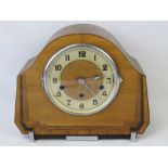 A 1930's 8-day mantel clock in an Art De