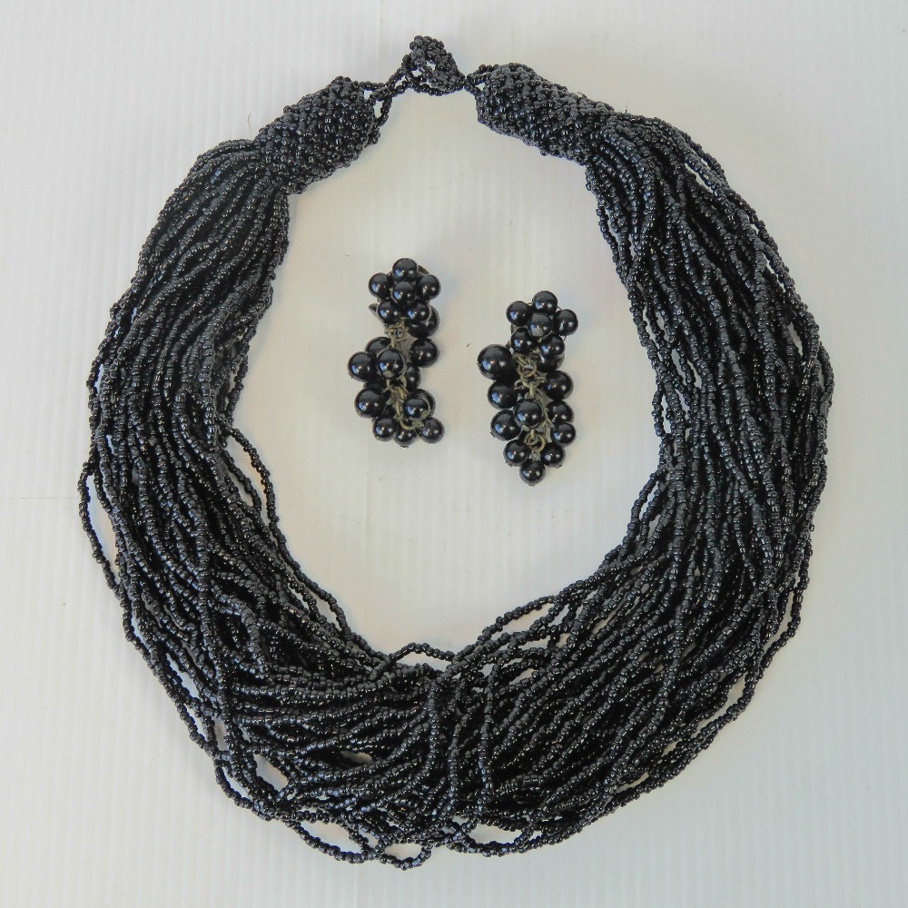 A pair of vintage German made black bead