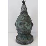An ethnic shrunken head figurine in the