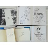 Various motor racing themed books includ