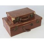 Two vintage suitcases; the larger measur