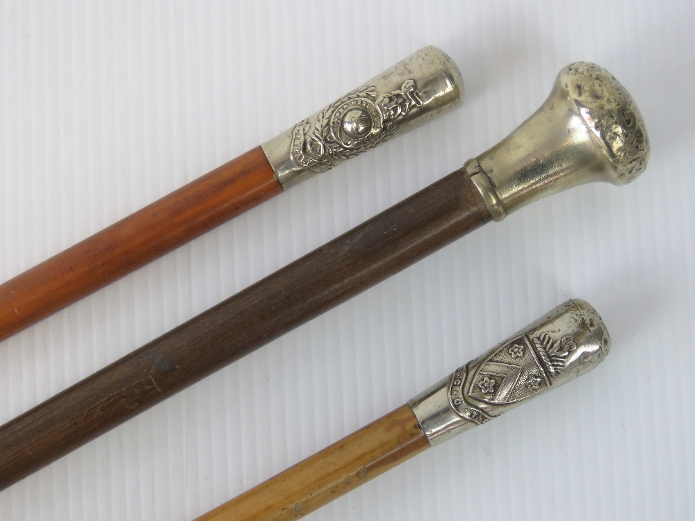 Three swagger sticks; Kings Crown Royal - Image 2 of 4