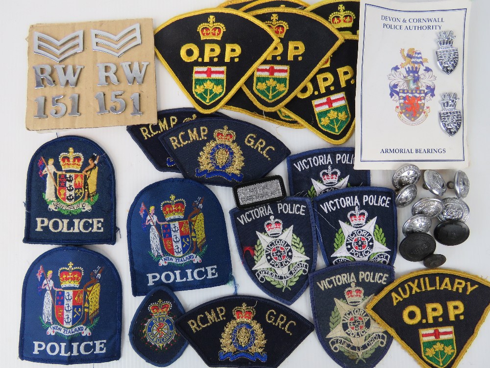 A quantity of assorted Police badges and