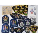 A quantity of assorted Police badges and