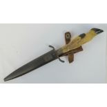 A WWI era hunting knife with deer slot h