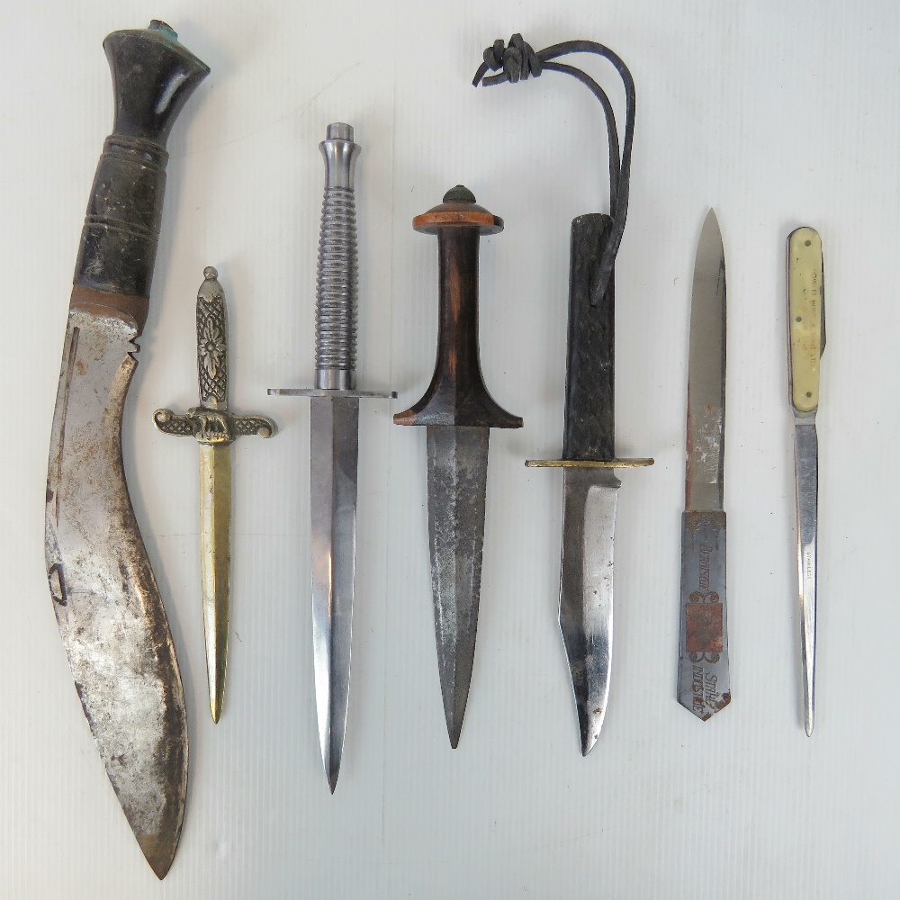 A quantity of knives including; a reprod