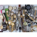 A quantity of assorted mens and ladies wristwatches.