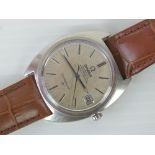 A vintage Omega Constellation chronometer wristwatch on brown leather crocodile effect Omega strap,