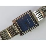 A Rennie Mackintosh design ladies wristwatch, square shaped head with navy blue dial.