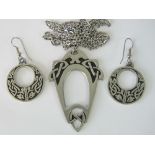 A pair of St Justin pewter Celtic design earrings within original box,