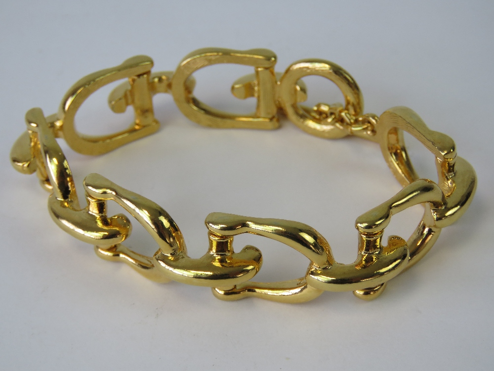 A vintage Gucci style stirrup bracelet, c1980's, stamped 4710 to back, 19.5cm in length.