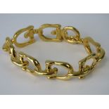 A vintage Gucci style stirrup bracelet, c1980's, stamped 4710 to back, 19.5cm in length.