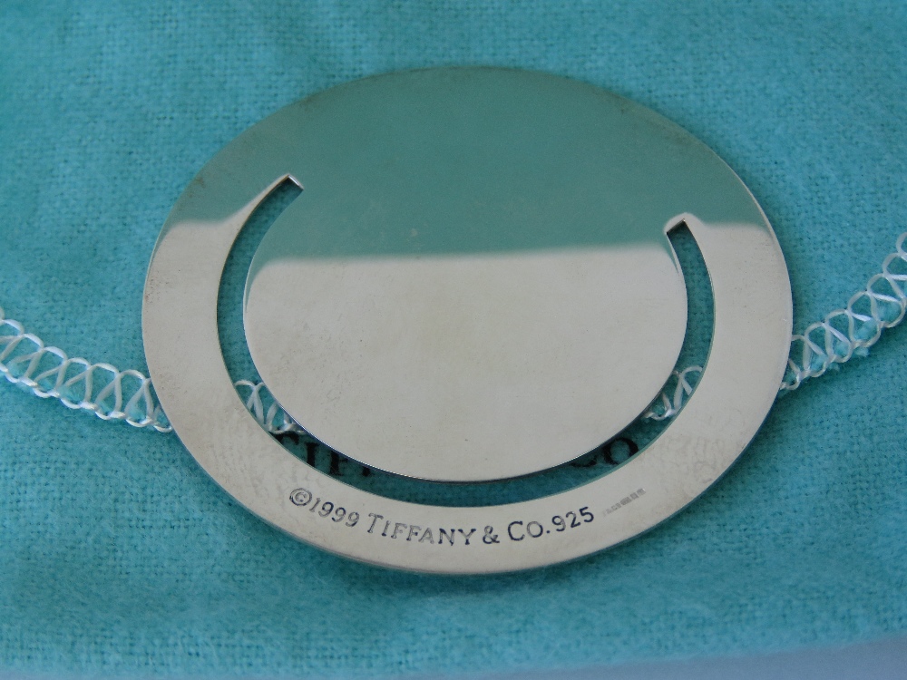 A HM silver Tiffany & Co bookmark of disc form, hallmarked London 2004, 5.