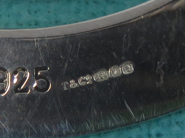 A HM silver Tiffany & Co bookmark of disc form, hallmarked London 2004, 5. - Image 3 of 3
