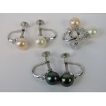 Three pairs of silver and pearl screw back earrings, each stamped 925.