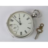 A silver American Watch Co Waltham key wind pocket watch, complete with key, case stamped A.W.