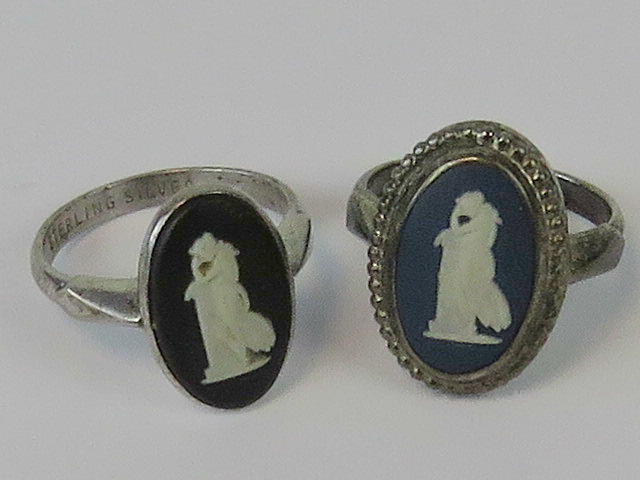 Two silver rings set with Wedgwood panels, one hallmarked and one stamped sterling.