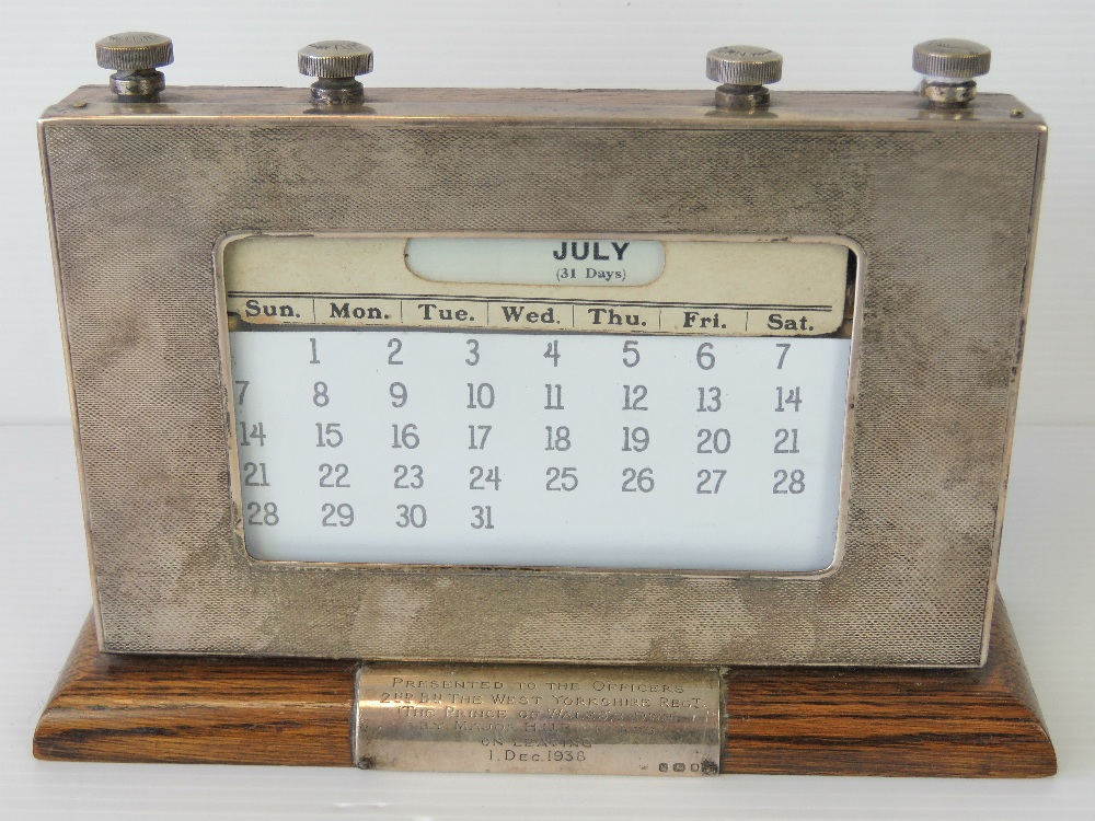A HM silver perpetual desk calendar having presentation plaque 'Presented to the Officers 2nd Bn