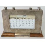 A HM silver perpetual desk calendar having presentation plaque 'Presented to the Officers 2nd Bn