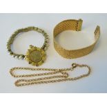 A small quantity of costume jewellery including; coin set pendant, bark effect articulated bracelet,