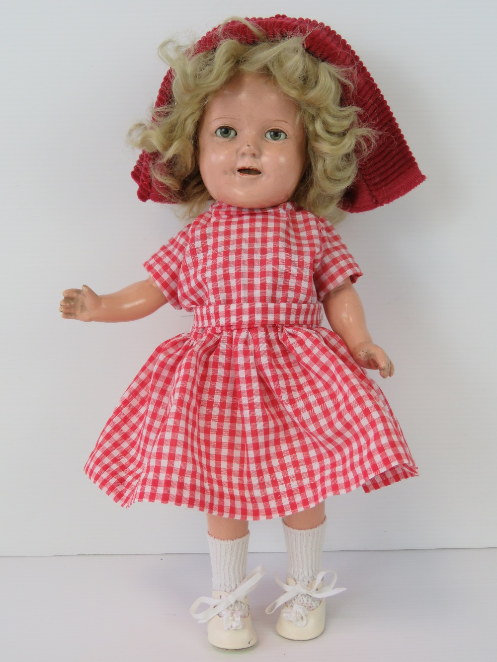 A Shirley Temple doll by Ideal, with sle