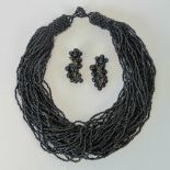 A pair of vintage German made black bead