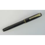 A Burnham 'self-filler' fountain pen wit