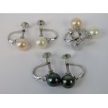 Three pairs of silver and pearl screw ba
