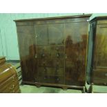 A large and impressive mahogany wardrobe