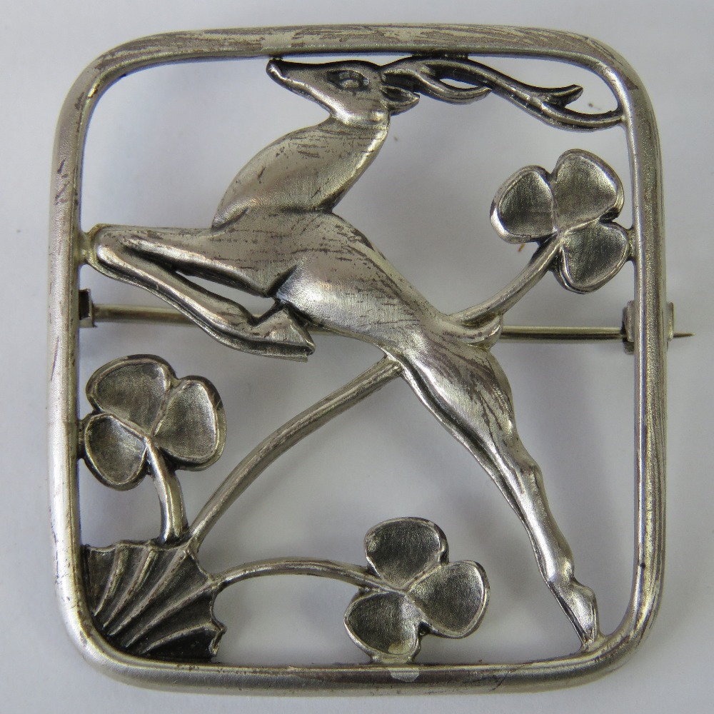 A George Tarratt HM silver brooch designed by Geoffrey Bellamy and depicting a leaping gazelle