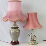 A ginger jar converted for use as a lamp, cream ground with wooden base and pink lamp shade, a/f.