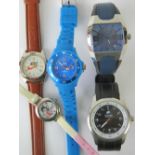 Four mens wristwatches; marked for Guinness, NIke, Ice and Police.