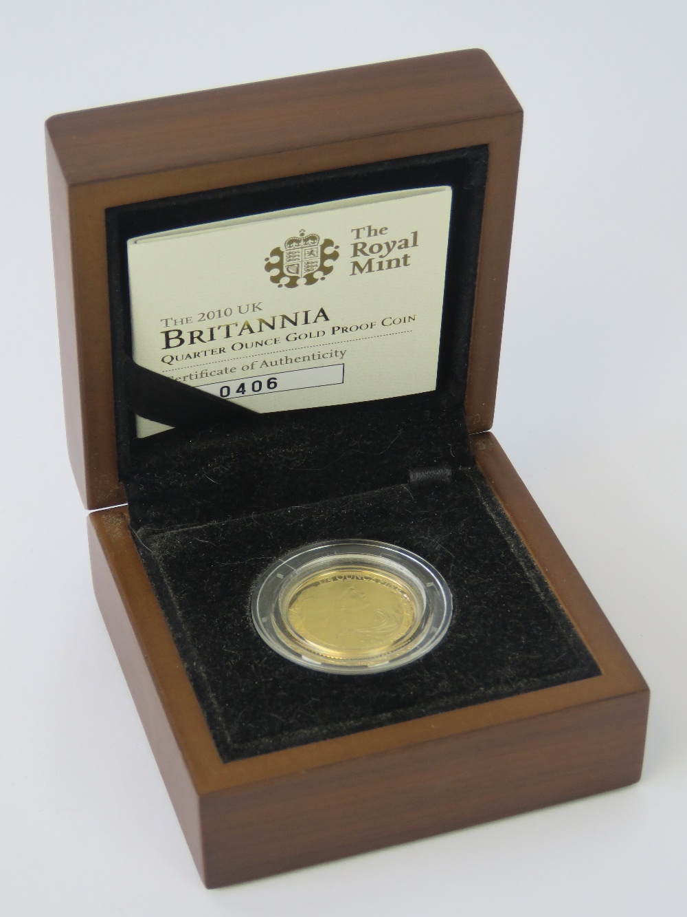 A 22ct gold proof 2010 Quarter Ounce £25 coin, 8.