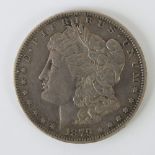 A 1879 Morgan Silver Dollar with New Orleans mint mark, 0.86ozt, EF condition.