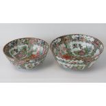 Two Cantonese famille rose bowls, profusely decorated with reserves of figures, flowers and birds,