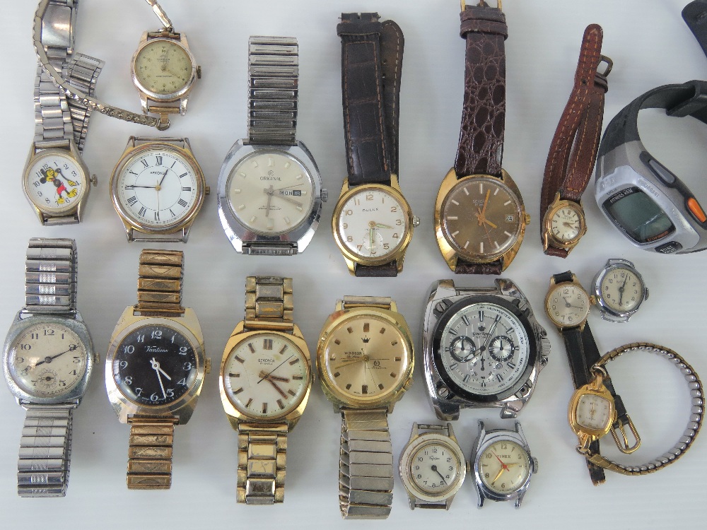 A watch selection containing various ladies and gents watches.