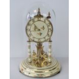 A c1960's Kieninger and Obergfell 400 day clock, ivory ground with floral decoration throughout,