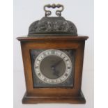 A Smiths eight day carriage clock with square brass and silvered dial,