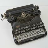 A Corona 'Criterion' vintage portable typewriter, with carrying case.