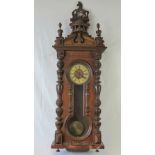 A good late Victorian walnut cased Vienna wall clock,