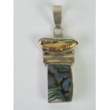 A silver pendant set with rectangular abalone shell panel and pearl, stamped 925, 5.3cm inc bale.