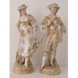 A pair of Continental porcelain costume figures of a gallant and his lady companion,