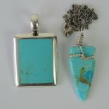 A rectangular silver pendant set with turquoise effect panel, hallmarked 925, 3.8 x 2.3cm.